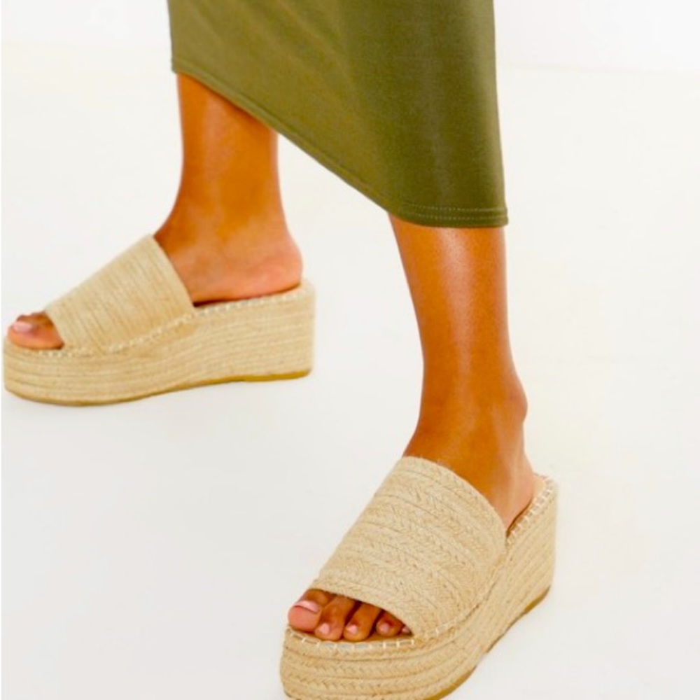 Platform sandals. Never worn.